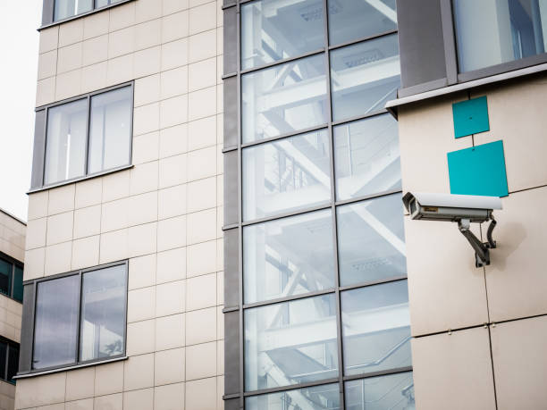 istock Surveillance camera on the facade of an office building 1213931942