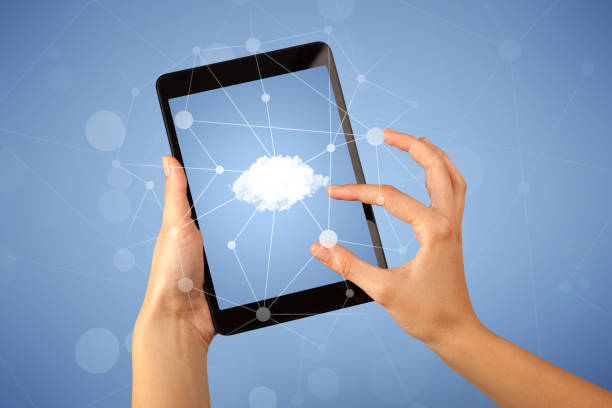 istock Female hand holding tablet 1213933392