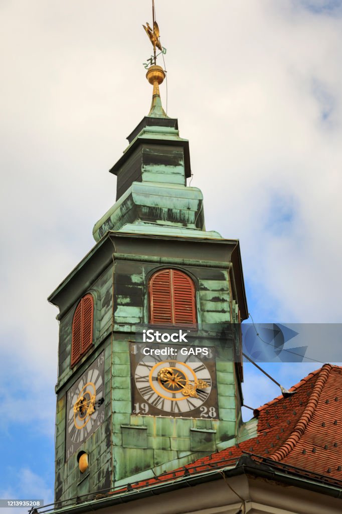clock tower of the Church of St Nicholas in Ljubljana clock tower of the Church of St Nicholas, the cathedral of the city and the most important Baroque church in Ljubljana; Ljubljana, Slovenia Cathedral Stock Photo
