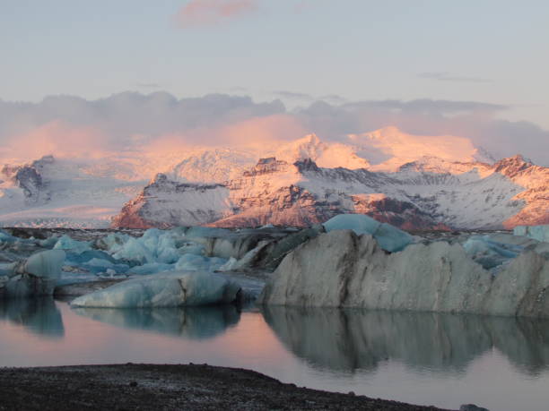 istock Sunset in Iceland with blue ice 1213936581