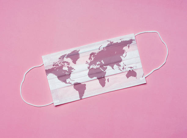 istock Coronavirus outbreak, Covid-19 Concept, World map on a surgical face mask 1213937511