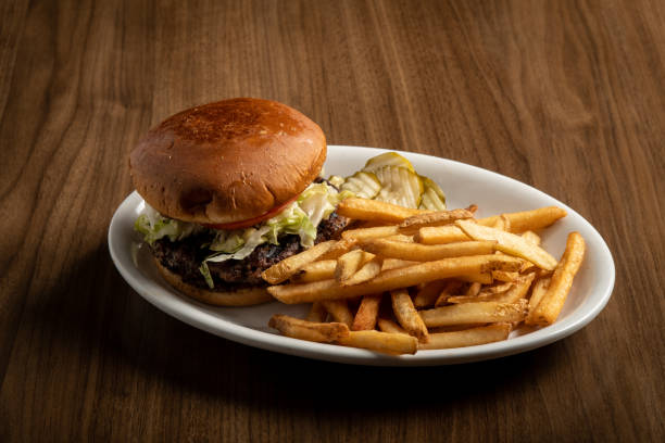 istock restaurant hamburger with fries 1213938364
