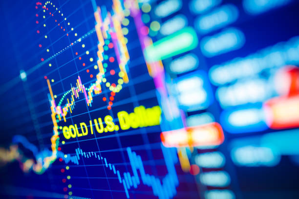 istock Data analyzing in commodities metal market: the charts and quotes on display. Gold price analysis. Classic gold volatility against the US dollar. 1213941727