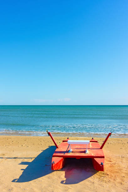 istock Red rescue boat on the beach in Rimini, 1213944844