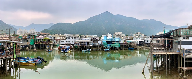 Tai O, Hong Kong - January 18, 2020: Stilt houses in Tai O. Tai O is a fishing town located on the western side of Lantau Island in Hong Kong. It is home to the Tanka people, a community of fisher folk who’ve built their houses on stilts above the tidal flats of Lantau Island for generations.