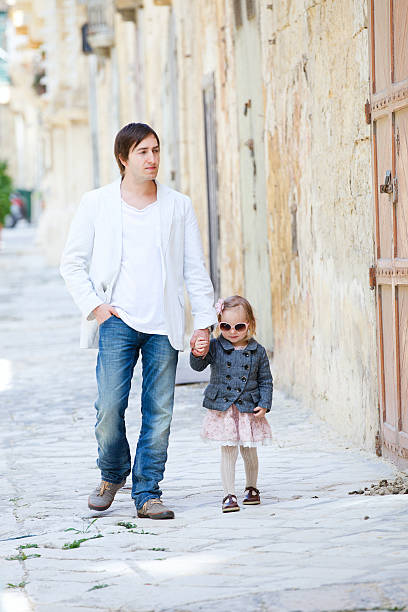 istock Father and daughter in city 121395024