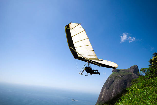 Hang-gliding  leap of faith stock pictures, royalty-free photos & images