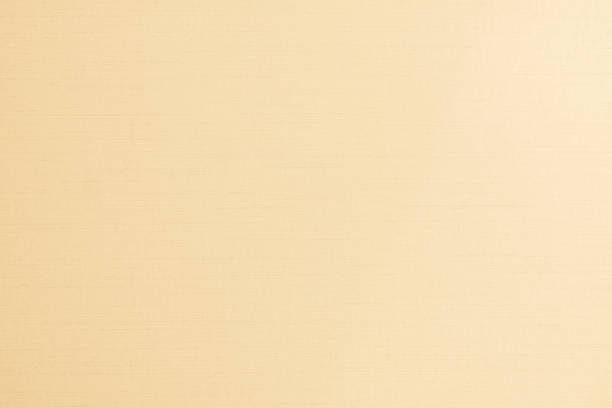 istock Cotton silk fabric wall paper texture pattern background in light pastel white yellow cream beige sepia tan brown color earth tone 1213960536