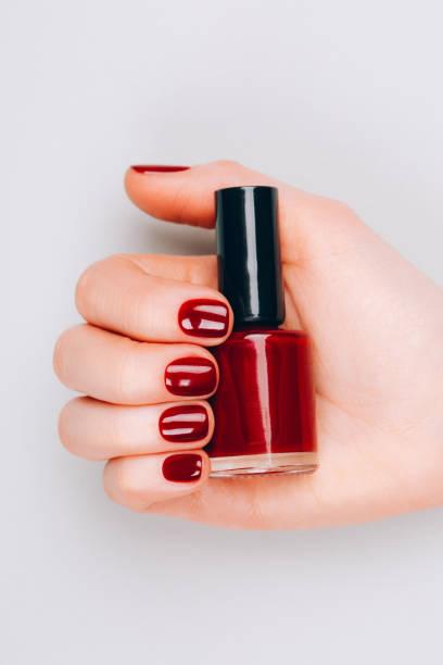 istock Manicure with bottle of nail polish 1213961079