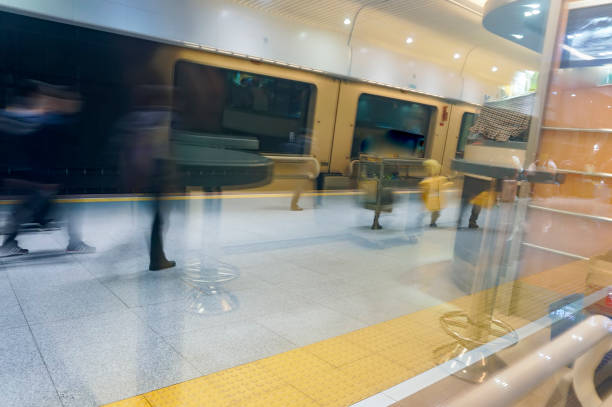 istock The hurried passengers moved on the platform 1213979670