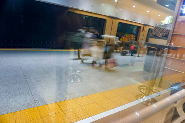 istock The hurried passengers moved on the platform 1213979676
