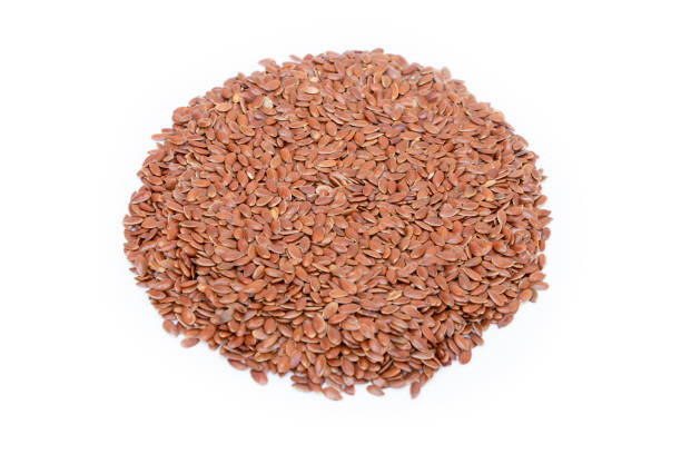 istock Heap of linseeds or flax seeds on white background 1213987746