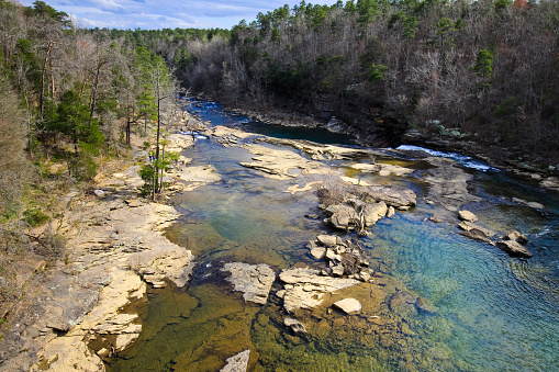 Taken this picture from a distant of the little river canyon in Alabama USA with the river flowing across. In the picture the the river flowing through the canyon.