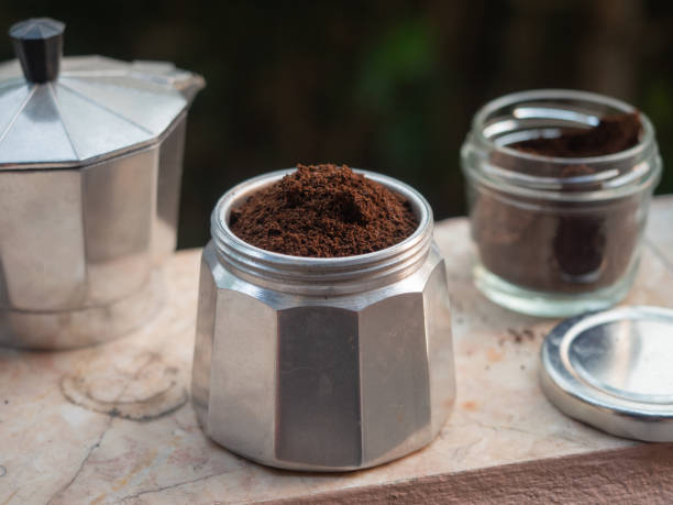 istock Ground coffee in Moka pot filter prepare for making coffee. 1213992027