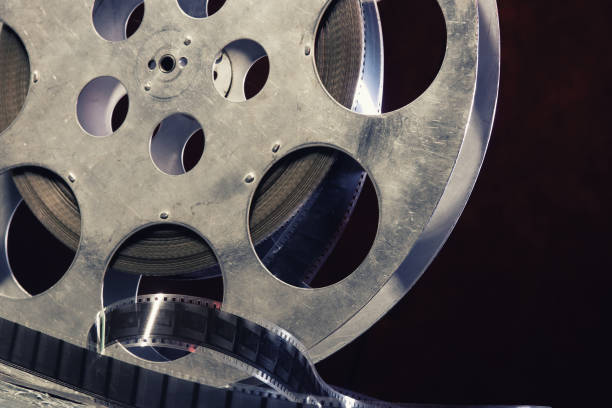 istock 35 mm film reel with dramatic lighting on a dark background 1213996831