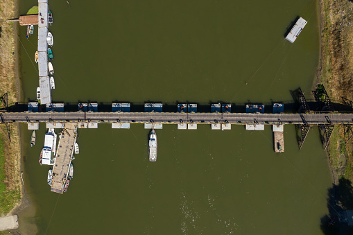Drone shot of the Bridge of Lions crossing the Matanzas River, which forms the Intracoastal Waterway in St. Augustine, Florida, on a sunny spring day.