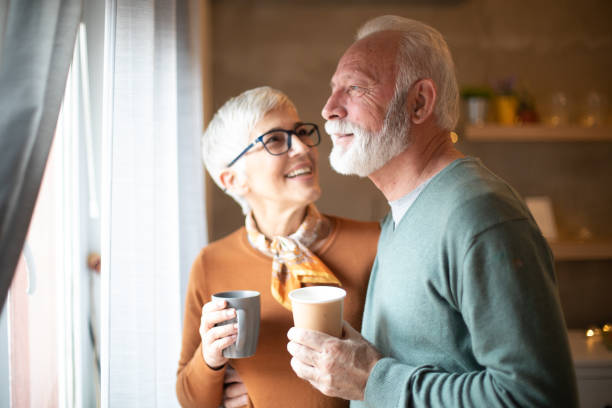 istock Beautiful senior couple drinking coffee. 1214002395
