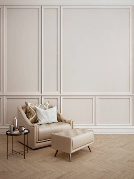 istock Modern classic interior.Armchair with stool and pillows,side table,vase.White wall and wooden floor. 1214004079