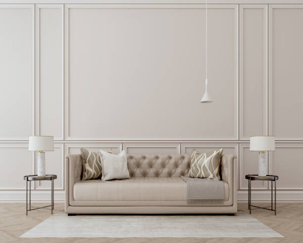 istock Modern classic interior.Sofa,side tables with lamps.White wall and wooden floor with carpet 1214004093