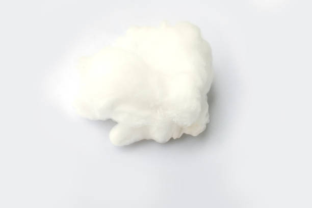 Cotton Wool Cloud isolated on Grey Background with Text Space. Top View of Clouds Made of Cotton