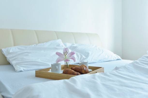istock sweet breakfast with croissant to bed 1214009186