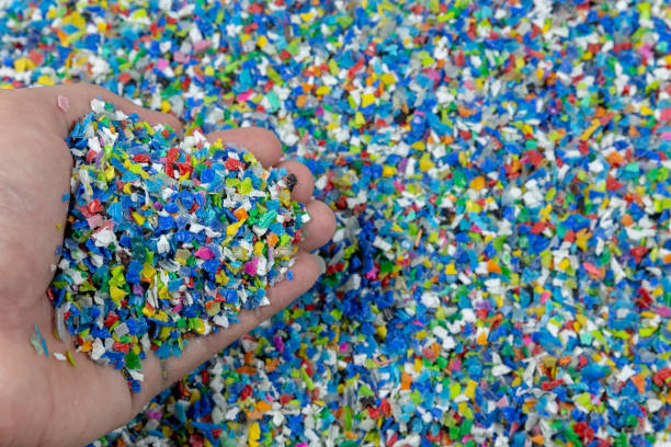 istock Close-up of plastic polymer granules. hand hold Polymer pellets. polymer plastic. compound polymer. 1214011526