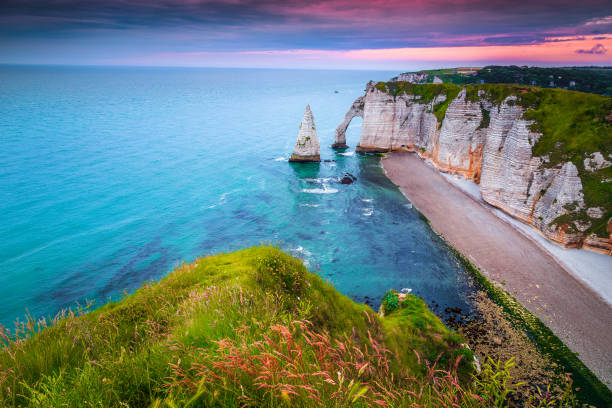 istock Admirable beach with high cliffs at sunset, Etretat, Normandy, France 1214012656