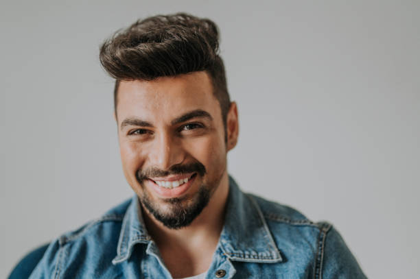 istock a head-shot of middle eastern handsome man with beard and his face expression 1214014522