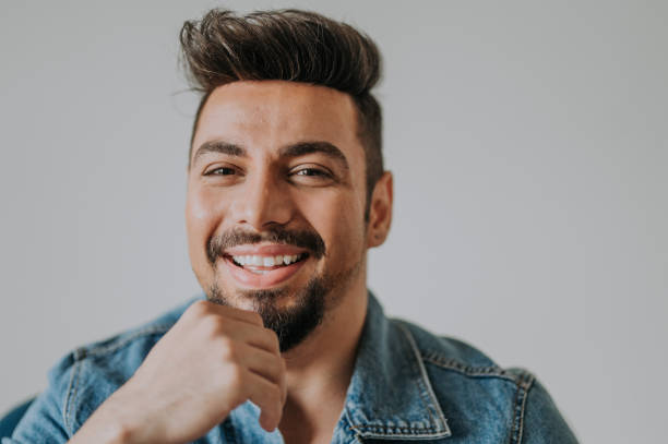 istock a head-shot of middle eastern handsome man with beard and his face expression happiness 1214014614