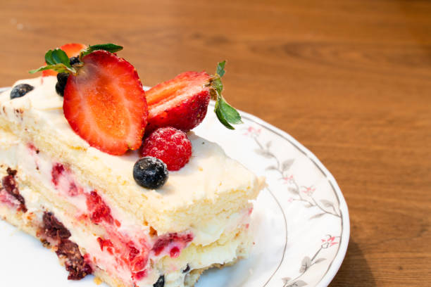 istock delicious cake with fresh fruit and berries close up 1214018305