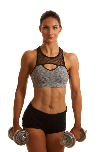 istock Beautuful hispanic woman workout with dumbbells studio portrait 1214019744