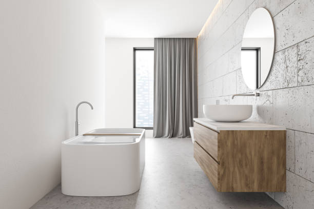 istock Stone bathroom interior with sink and tub 1214020261