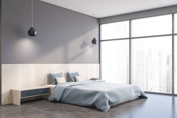istock Gray master bedroom corner with cityscape 1214022107