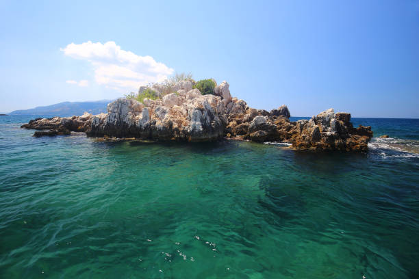 istock Island in Albania. Blue water. 1214023369