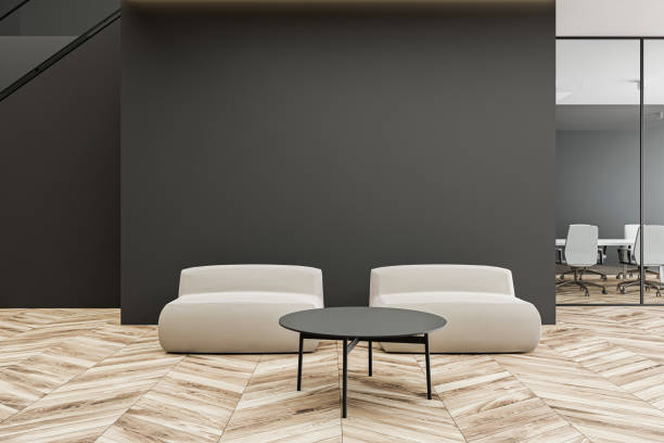 istock Armchairs in grey office waiting room 1214023786