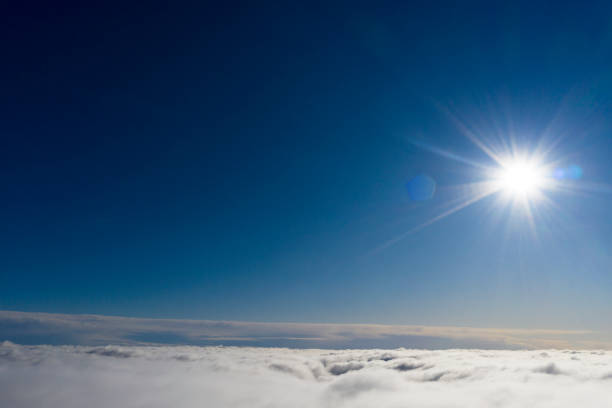 istock Aerial view White clouds in blue sky. View from drone. Aerial top view cloudscape. Texture of clouds. View from above. Sunrise or sunset over clouds. Panorama clouds 1214024834