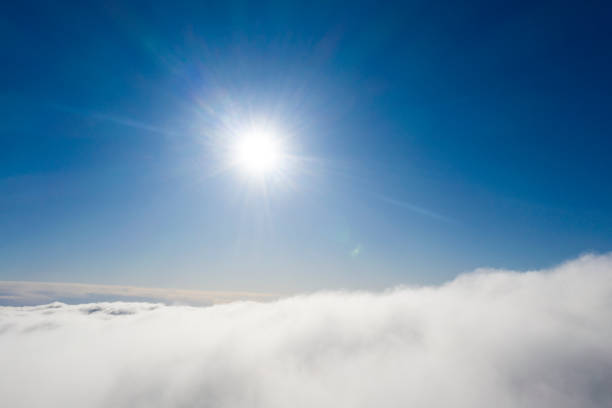 istock Aerial view White clouds in blue sky. View from drone. Aerial top view cloudscape. Texture of clouds. View from above. Sunrise or sunset over clouds. Panorama clouds 1214024987
