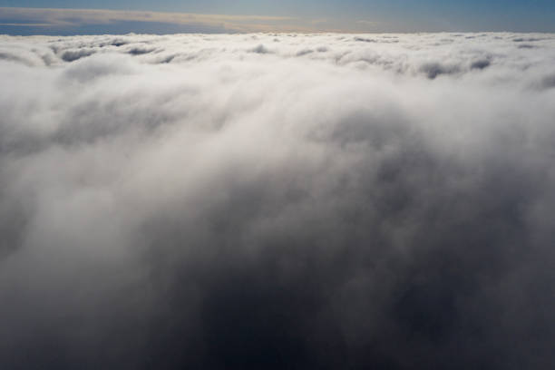 istock Aerial view White clouds in blue sky. View from drone. Aerial top view cloudscape. Texture of clouds. View from above. Sunrise or sunset over clouds. Panorama clouds 1214025059