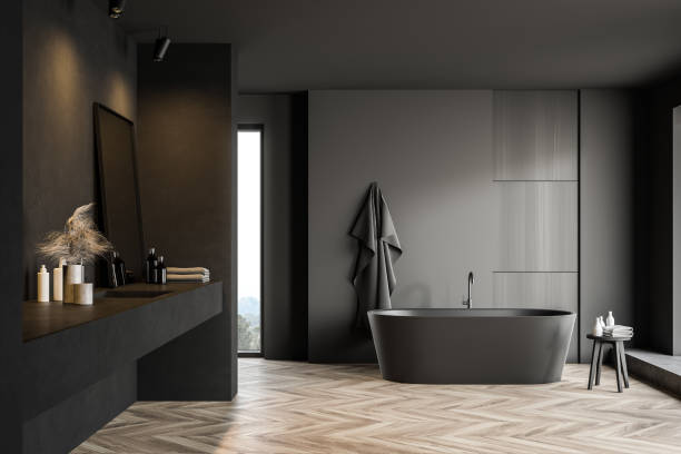 istock Dark gray bathroom with tub and sink 1214025541