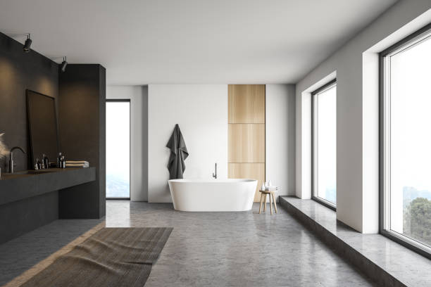 istock Black and white bathroom, tub and sink, front view 1214026184