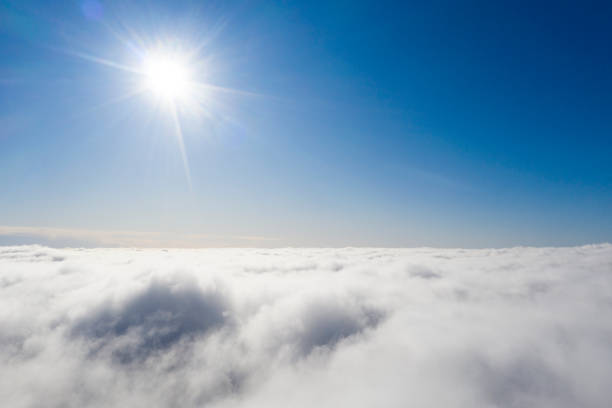 istock Aerial view White clouds in blue sky. View from drone. Aerial top view cloudscape. Texture of clouds. View from above. Sunrise or sunset over clouds. Panorama clouds 1214026589