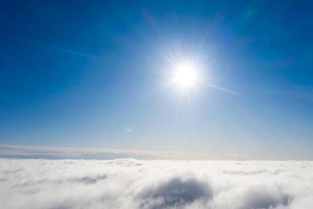istock Aerial view White clouds in blue sky. View from drone. Aerial top view cloudscape. Texture of clouds. View from above. Sunrise or sunset over clouds. Panorama clouds 1214026685