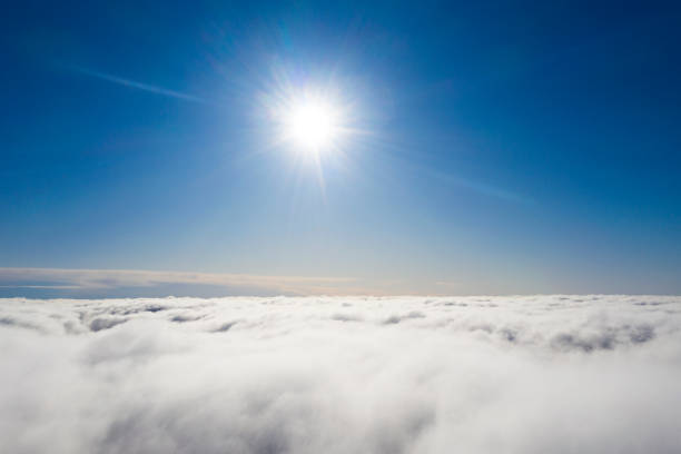 istock Aerial view White clouds in blue sky. View from drone. Aerial top view cloudscape. Texture of clouds. View from above. Sunrise or sunset over clouds. Panorama clouds 1214026891