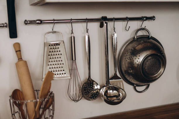 istock kitchen utensils hanging on the wall 1214027881