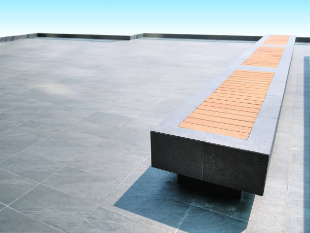 Stone Bench on Tiled Floor Isolated on Blue Background