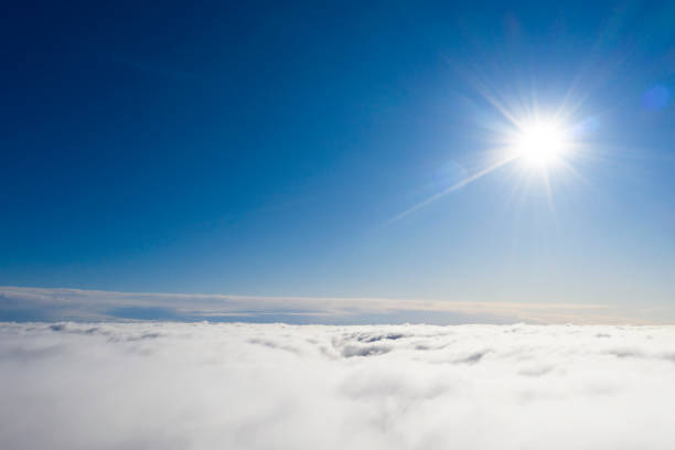 istock Aerial view White clouds in blue sky. View from drone. Aerial top view cloudscape. Texture of clouds. View from above. Sunrise or sunset over clouds. Panorama clouds 1214027991