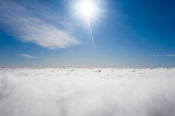 istock Aerial view White clouds in blue sky. View from drone. Aerial top view cloudscape. Texture of clouds. View from above. Sunrise or sunset over clouds. Panorama clouds 1214028054