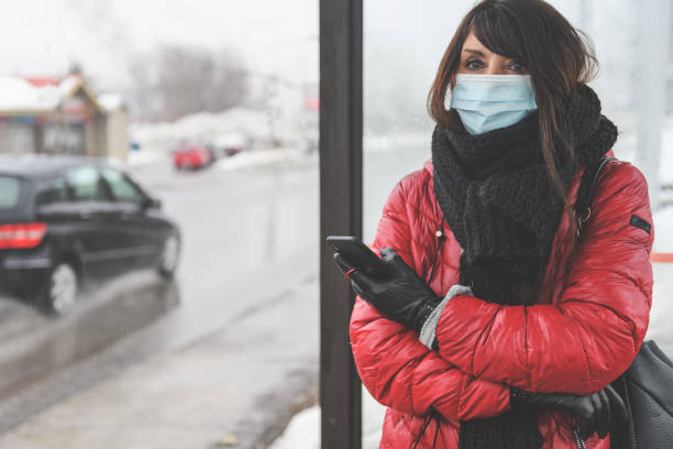 istock Woman waiting for the bus 1214033876