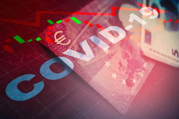 Europe stockmarket chart downtrend with banknote background, Covid19 virus pandemic crisis