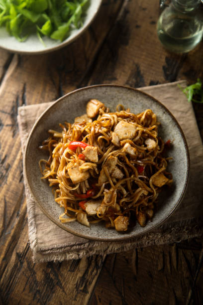 istock Rice noodles with chicken 1214042168